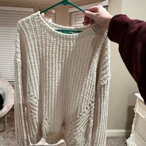 cream colored sweater